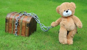 Teddy bear with a treasure chest